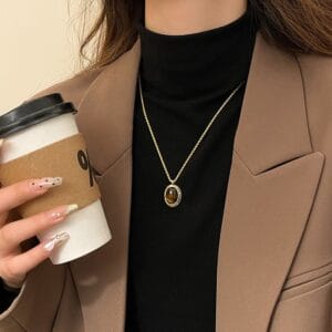 Medra tiger's eye metal necklace